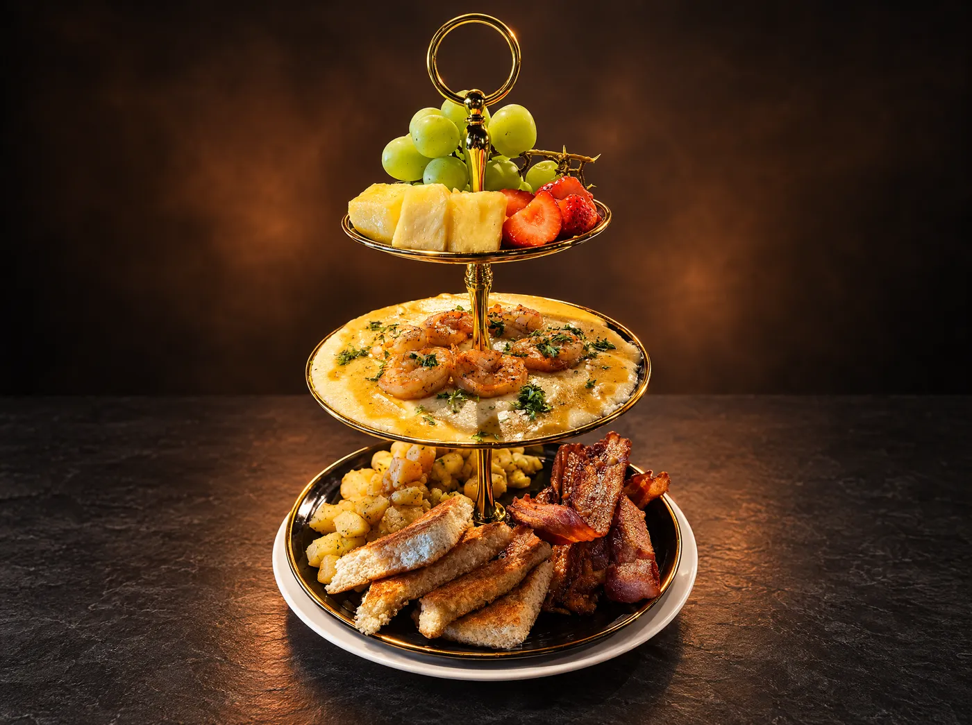 501 Royale three tier platter with fruit, shrimp and grits, and breakfast classics
