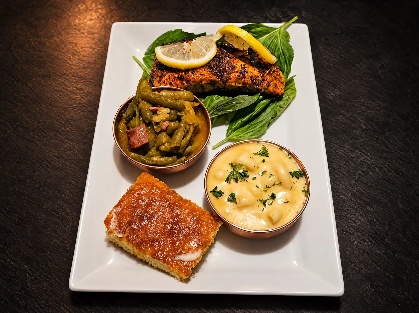 Grilled salmon with green beans, mac and cheese and cornbread